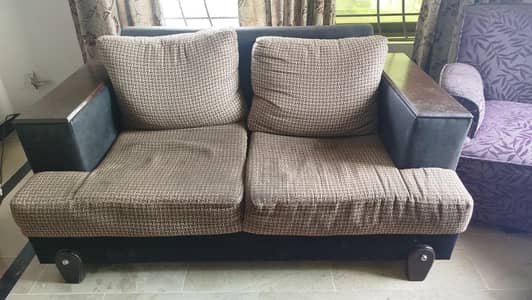 two seater sofa in good condition only required to wash