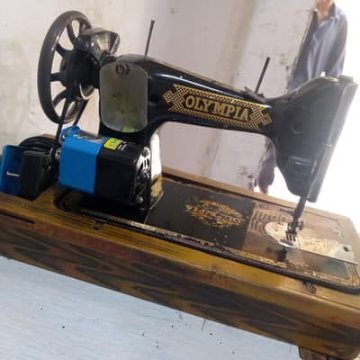 urgent for sale Olympia machine 10 by 10