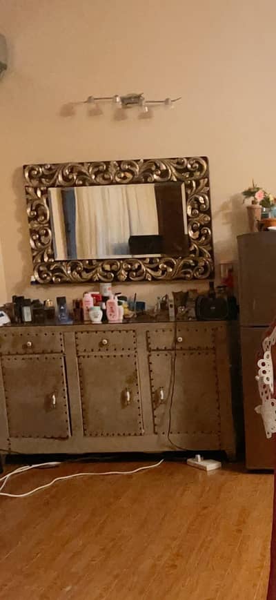 Bed with side tables and dressing table