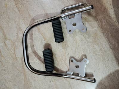 Honda Pridor 100 Parts Footrest and Carrier