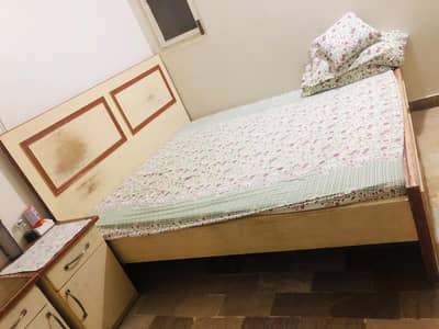 Bed and mattress with side tables