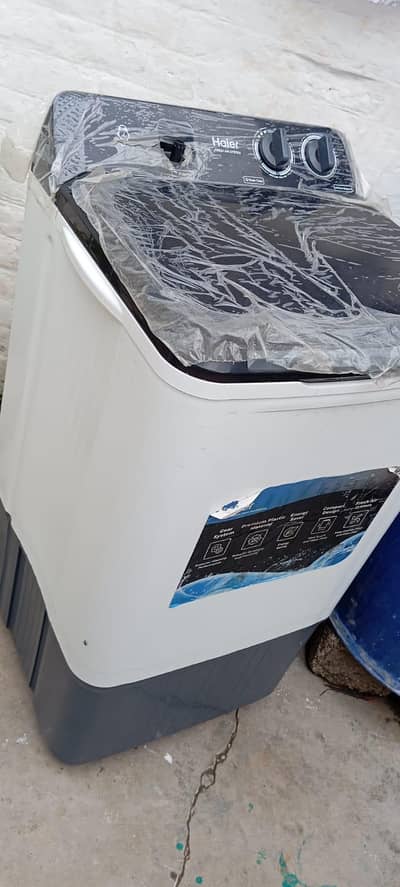 Haier washing Machine full new condition, only one month used