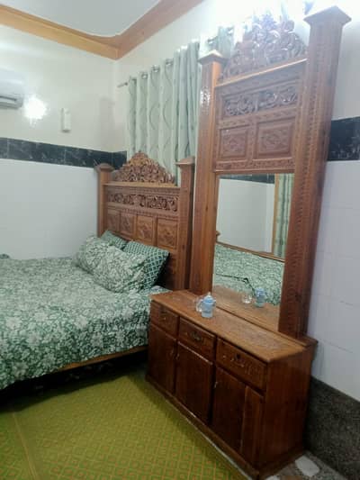 wooden bed and furniture