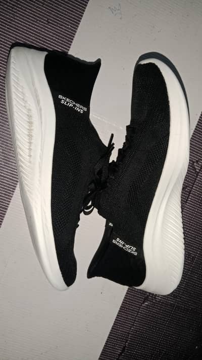 Sketchers original size 9