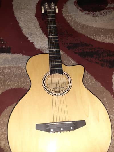 Lightly used acoustic guitar