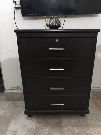 very strong dresser with 1 lock and 3 drawers