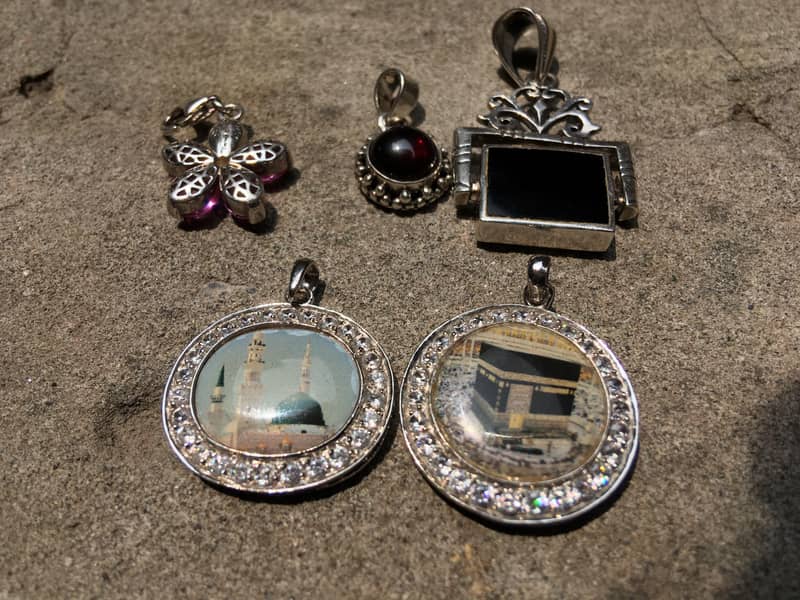 silver ring or locket 4