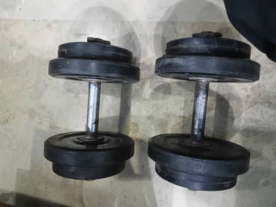 Dumbells 4 - 2kg plates , 4 - 1kg plates