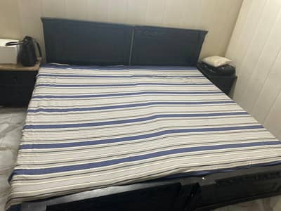 2 Single Beds with 2 Matching Side Tables.
