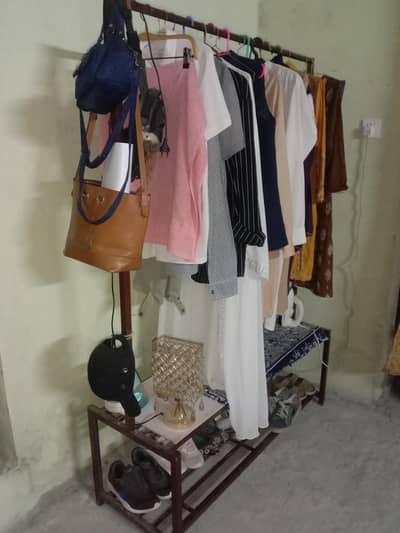 Clothe Hanger + Iron space + shoes space + Bages space