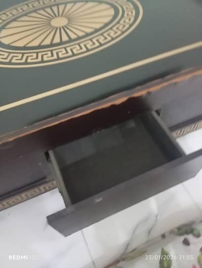 wooden table with top glass