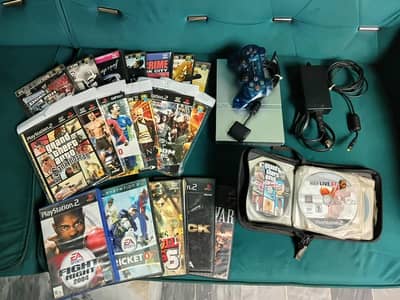 PS2 Silver with Game Discs