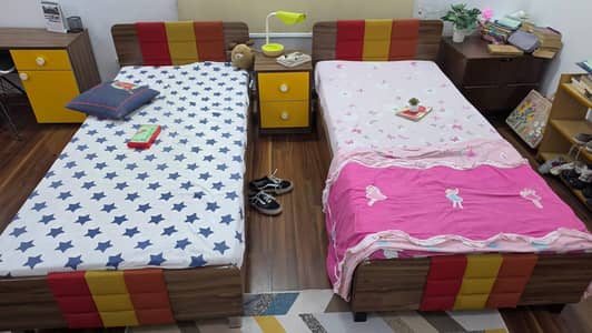 Single Beds and Side Table