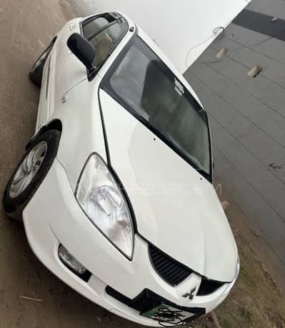 Mitsubishi Lancer 2005 better then balino bolan cf Honda