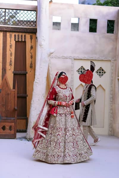 Maroon net bridal dress