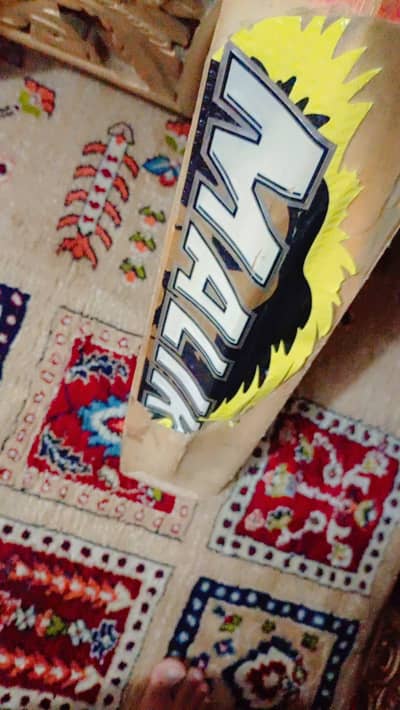 An original MB Malik hardball bat