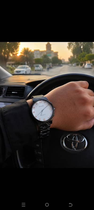 silver tomi watch