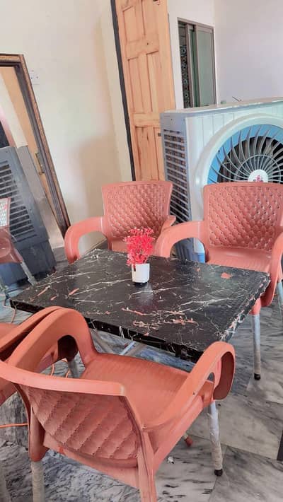 plastic chairs with table