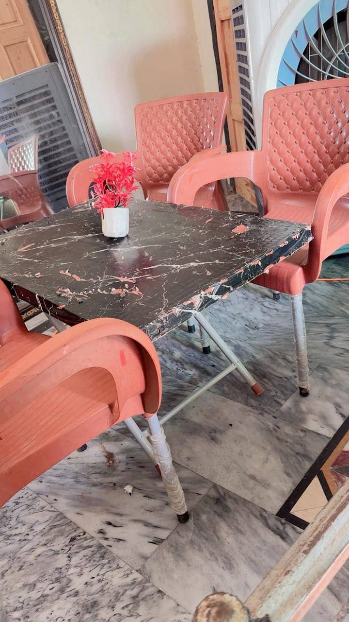 plastic chairs with table 1