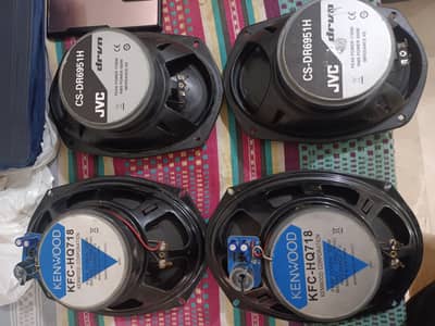 two Kenwood and two JVC car speakers