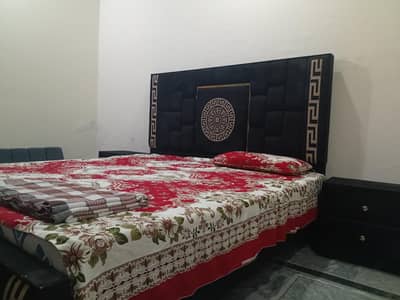 Cushion bed with side tables and mattress
