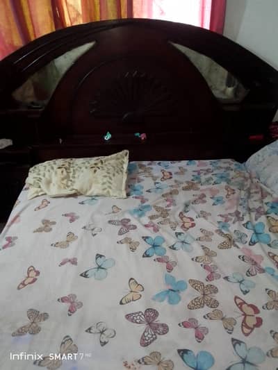 bed with attach side tables