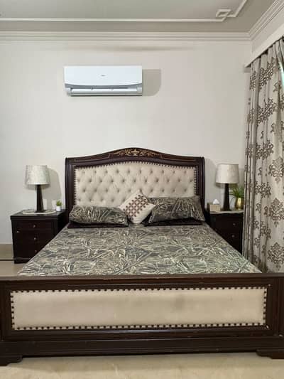 Bed with side tables