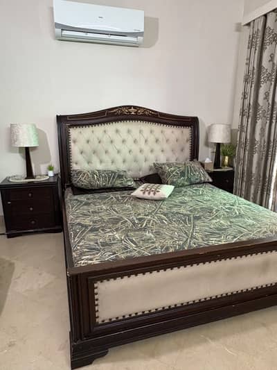 Bed with side tables