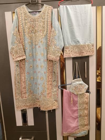 Brand new dress with dupatta and potli