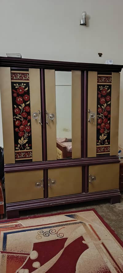 iron Almari gold colour
