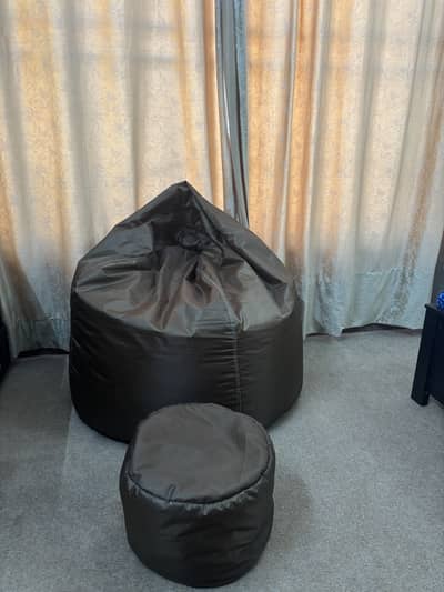 Bean bag with stool brown colour.