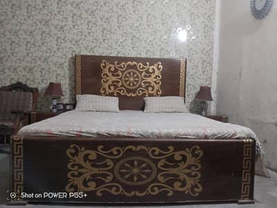 king size bed with 2 side tables