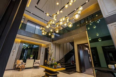 HIGH-END LIVING! SOPHISTICATED 1 KANAL HOME IN DHA PHASE 7