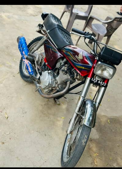 honda 125 red color number lahore Pakistan