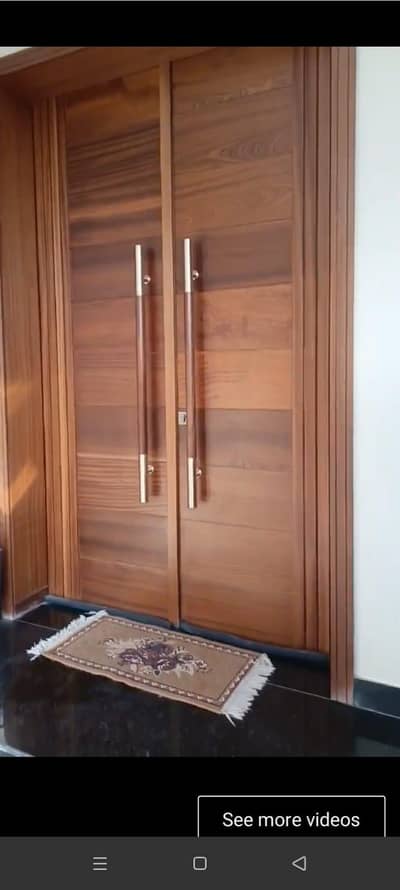wooden doors and  media wall wardrobs