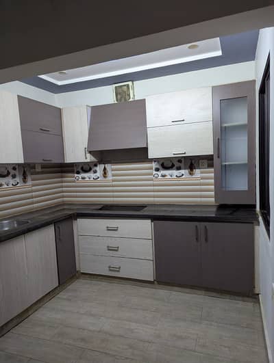3 bed drawing lounge newly renovated ground floor portion for rent with car parking 24 hours water and electricity separate gate and meters