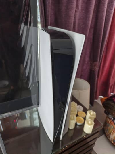PS5 with 2 controllers and games