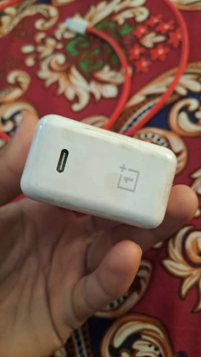 one + orignal charger and cable new