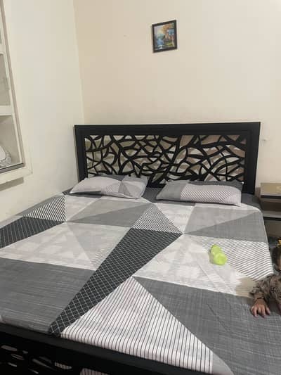 Iron king size bed