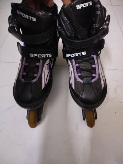 purple and black skating shoes