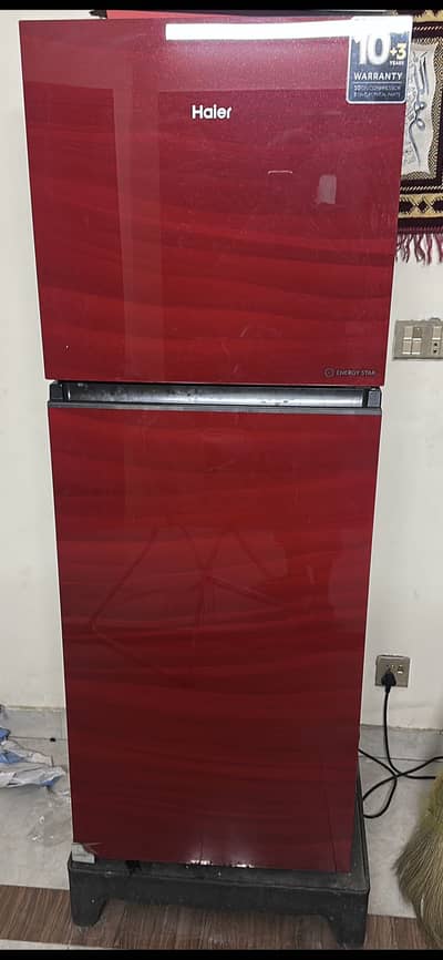 Haier Energy Star red Glass Door Refrigerator just like brand new