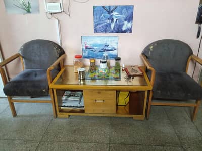 2 chairs and a table set