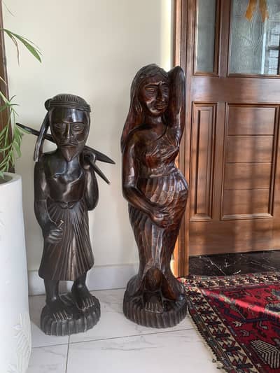 Hand Carved Solid Wooden Tribal Sculptures (Set of 2)
