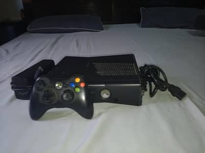 Xbox 360 with original controller and include 35 games