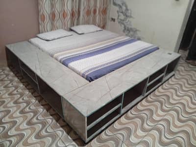 lower profile bed ( iron made) with side storage almira's