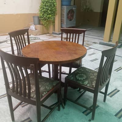 wooden dining table with four chairs for sale