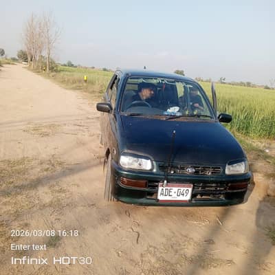 Daihatsu Cuore 2001 total ganieun call 03006137232 kami pashi ho  gi