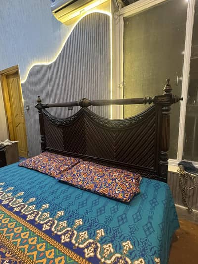 beautiful king size bed with side tables