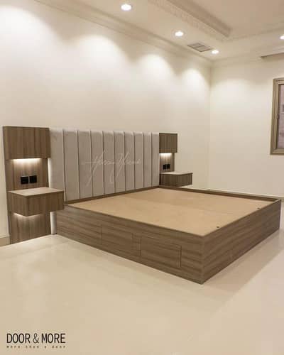 bed with attached side tables