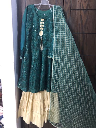 Green frock with golden gharara